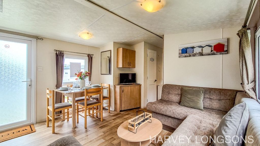 Property photo 3 of 20 Lounge And Dining Area With Fitted Seating Inside The Delta Feria Holiday Home
