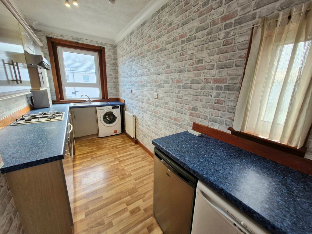 Property photo 3 of 6 Kitchen
