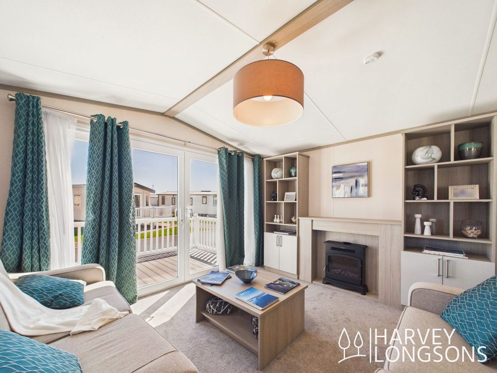 Property photo 2 of 18 Regal Charmouth Lounge With Patio Doors And Decking At Amble Links Holiday Park
