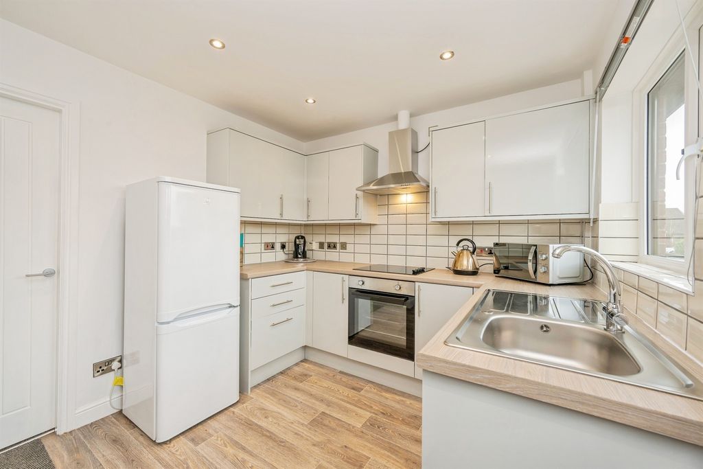 Property photo 3 of 19 Breakfast Kitchen: