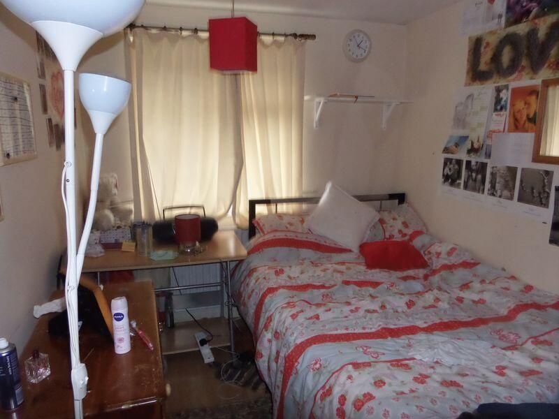 Property photo 3 of 6 A Cozy Bedroom Featuring A Double Bed With Floral ...