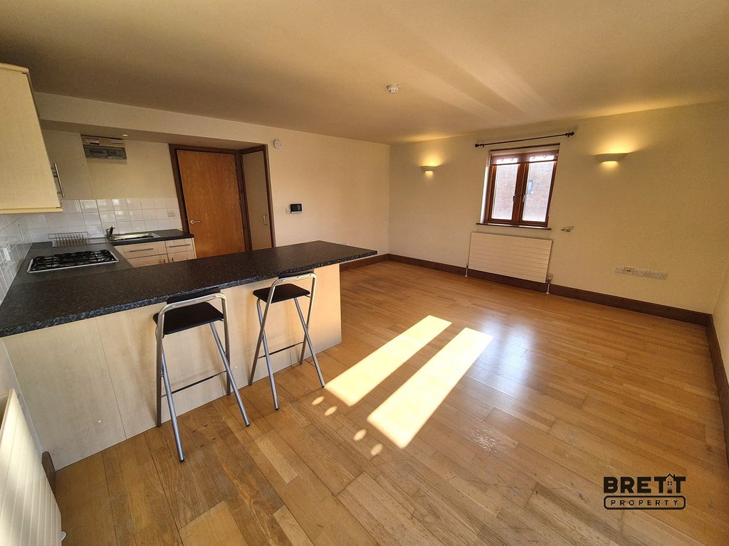 Property photo 3 of 8 Kitchen-Dining And Living Room