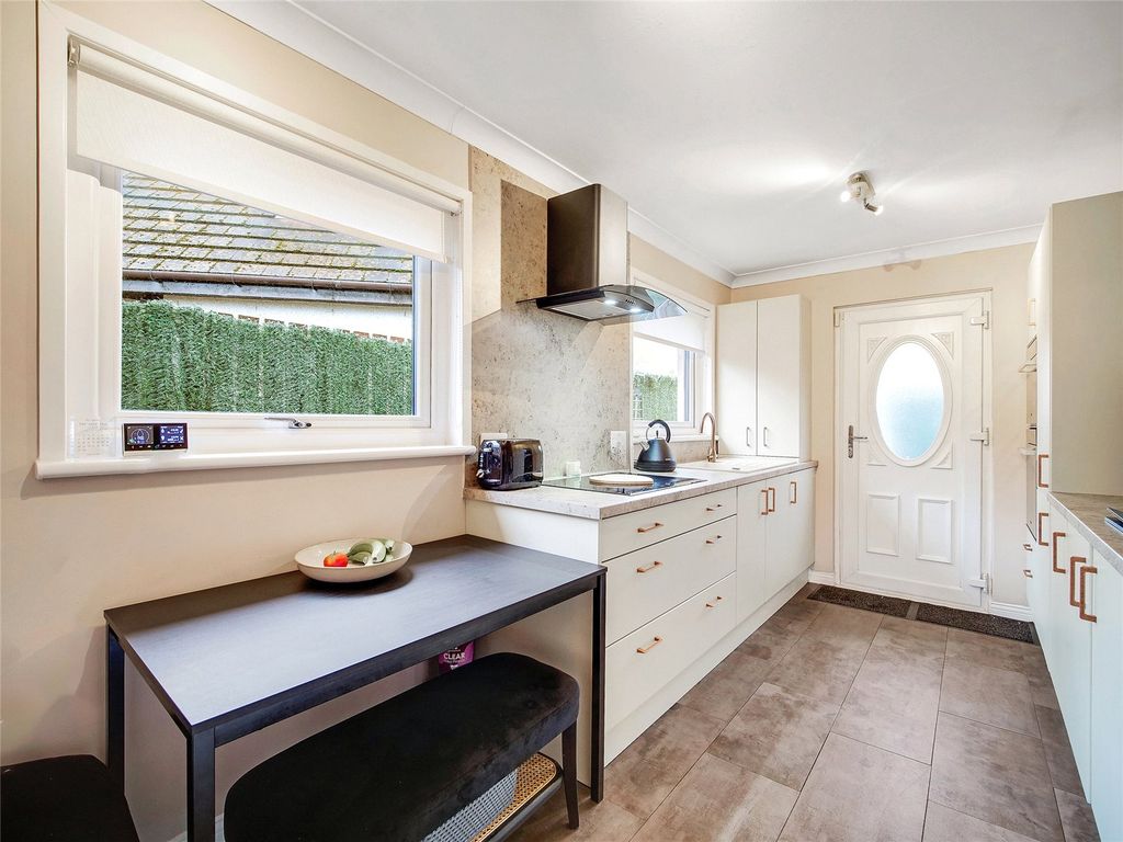 Property photo 3 of 16 Dining Kitchen