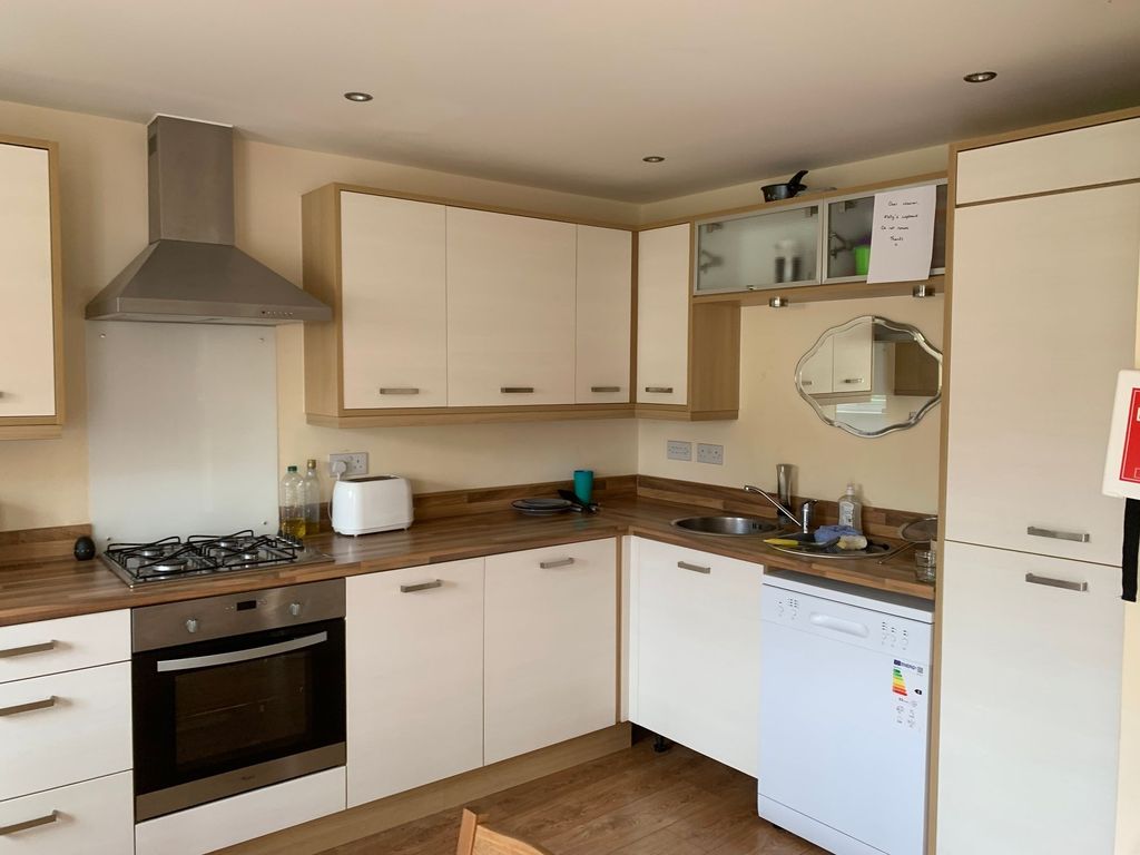Property photo 1 of 9 Bright And Modern Kitchen Featuring Clean Wooden c...
