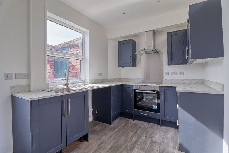 Property photo 3 of 8 Kitchen