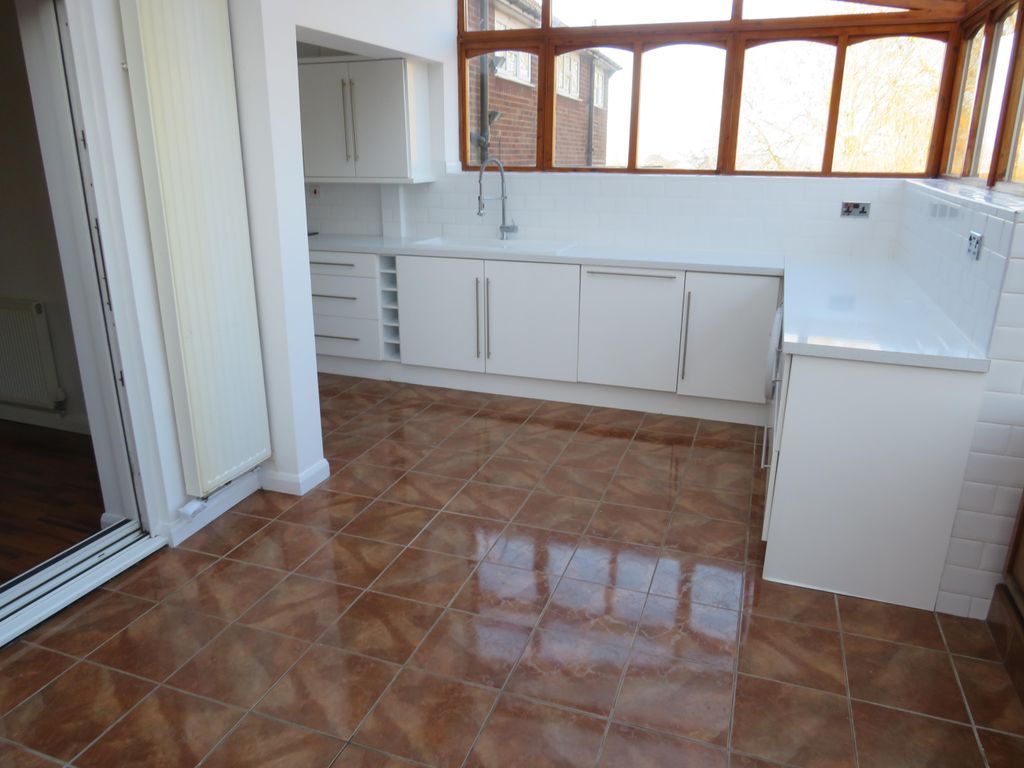 Property photo 2 of 12 Conservatory
