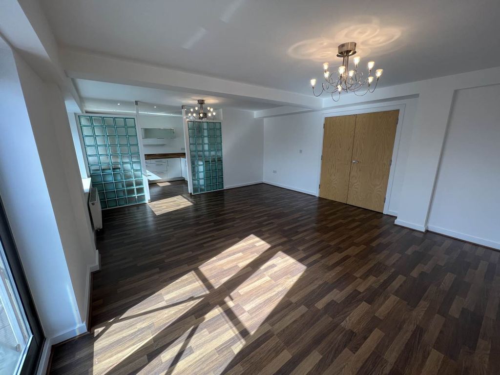 Property photo 1 of 11 Kitchen Living Area