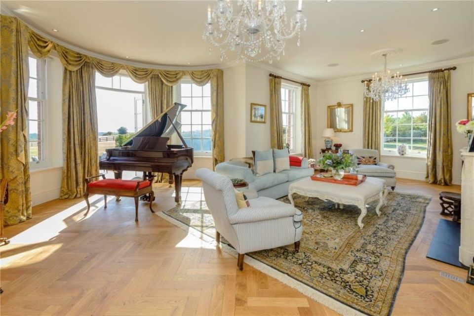 Property photo 1 of 1 A Spacious And Elegant Living Room Featuring Large...