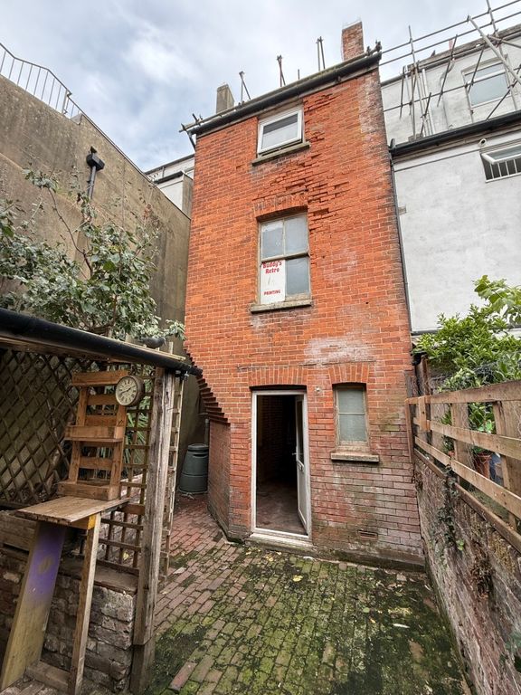 Property photo 2 of 38 Rear View Of Redbrick Property With Yard Area