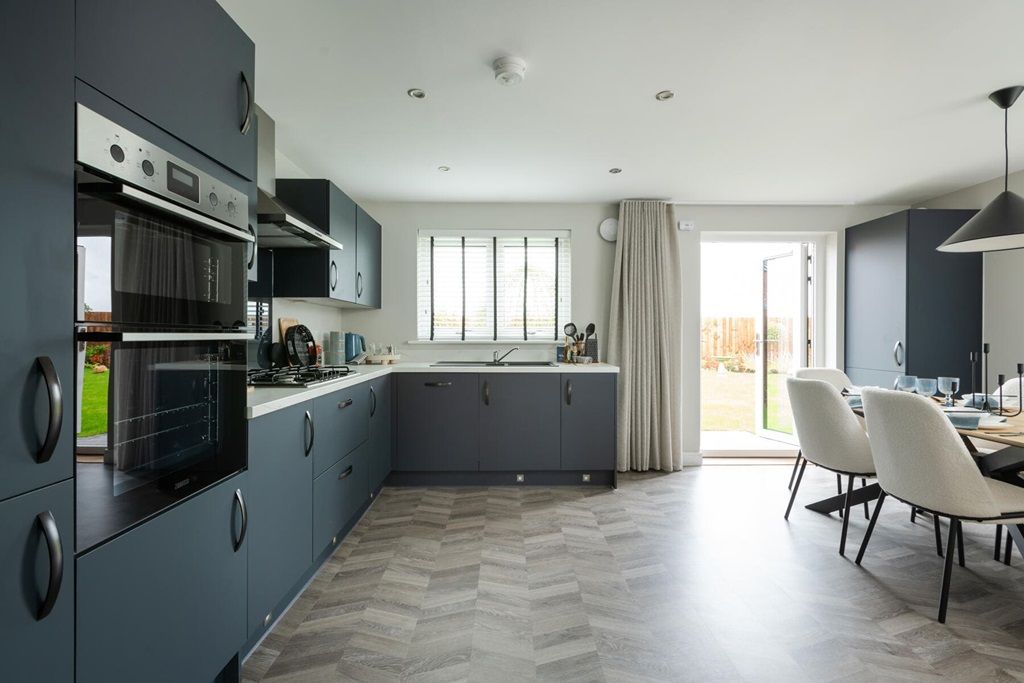 Property photo 1 of 12 The Spacious Kitchen/Dining Area Has Double Doors To The Rear Garden