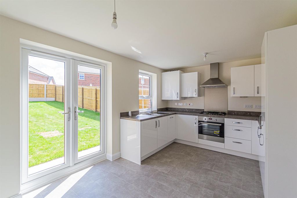 Property photo 2 of 13 Dining Kitchen