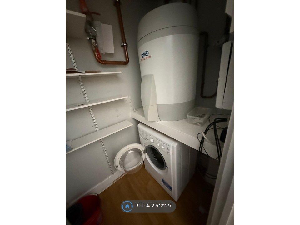 Property photo 3 of 6 Utility With Washing Machine