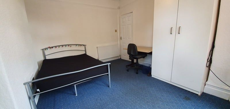 Property photo 1 of 13 Bright And Tidy Single Bedroom Featuring A Simple ...