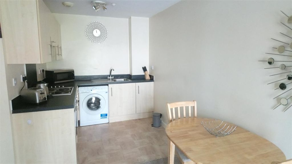 Property photo 3 of 4 Kitchen
