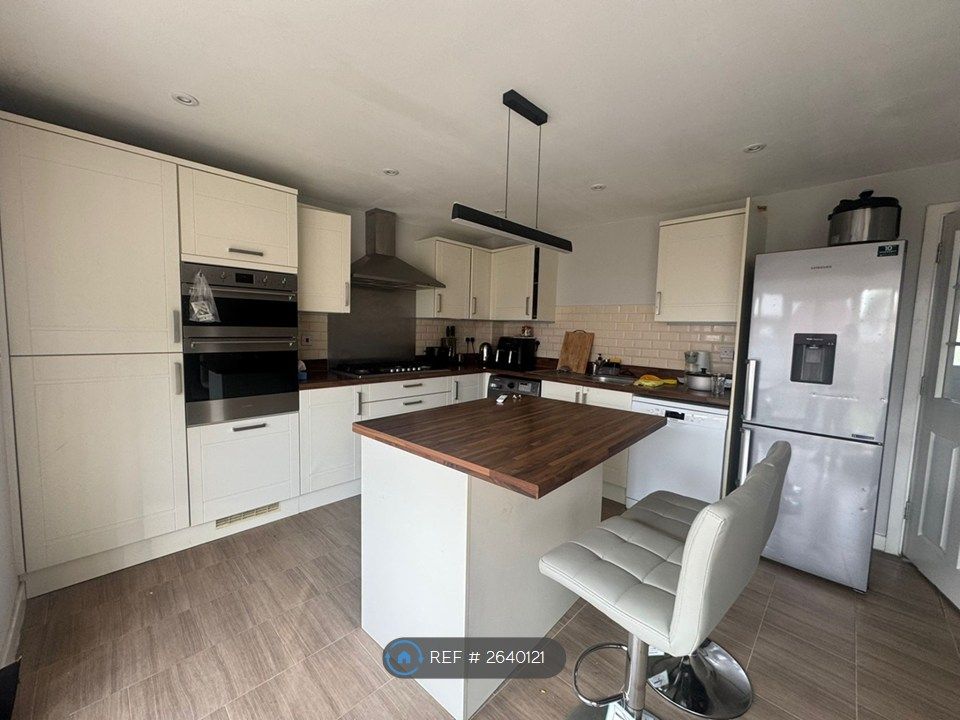 Property photo 3 of 4 Shared Living Space: Kitchen