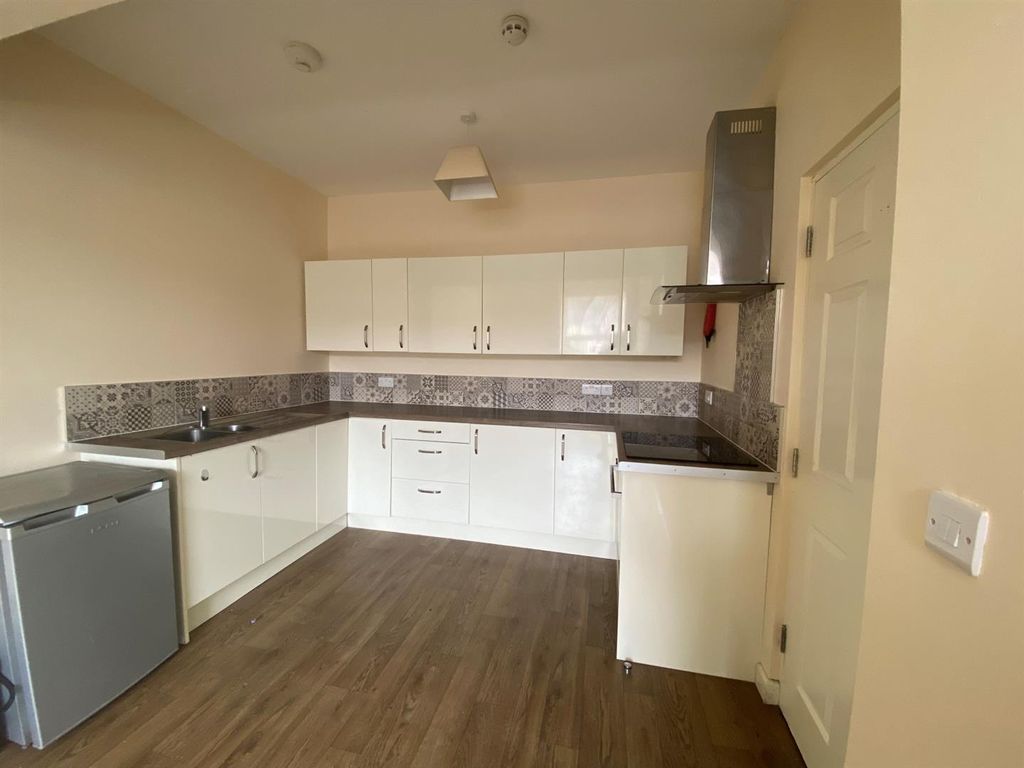 Property photo 3 of 6 Kitchen Area