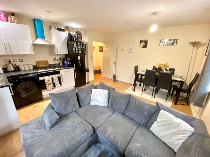 Property photo 3 of 8 Living Room And Kitchen