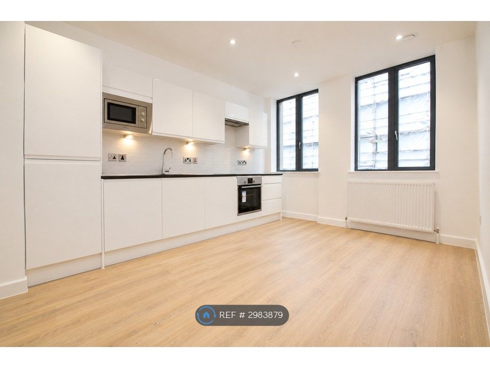 Property photo 1 of 7 Kitchen/Living Area