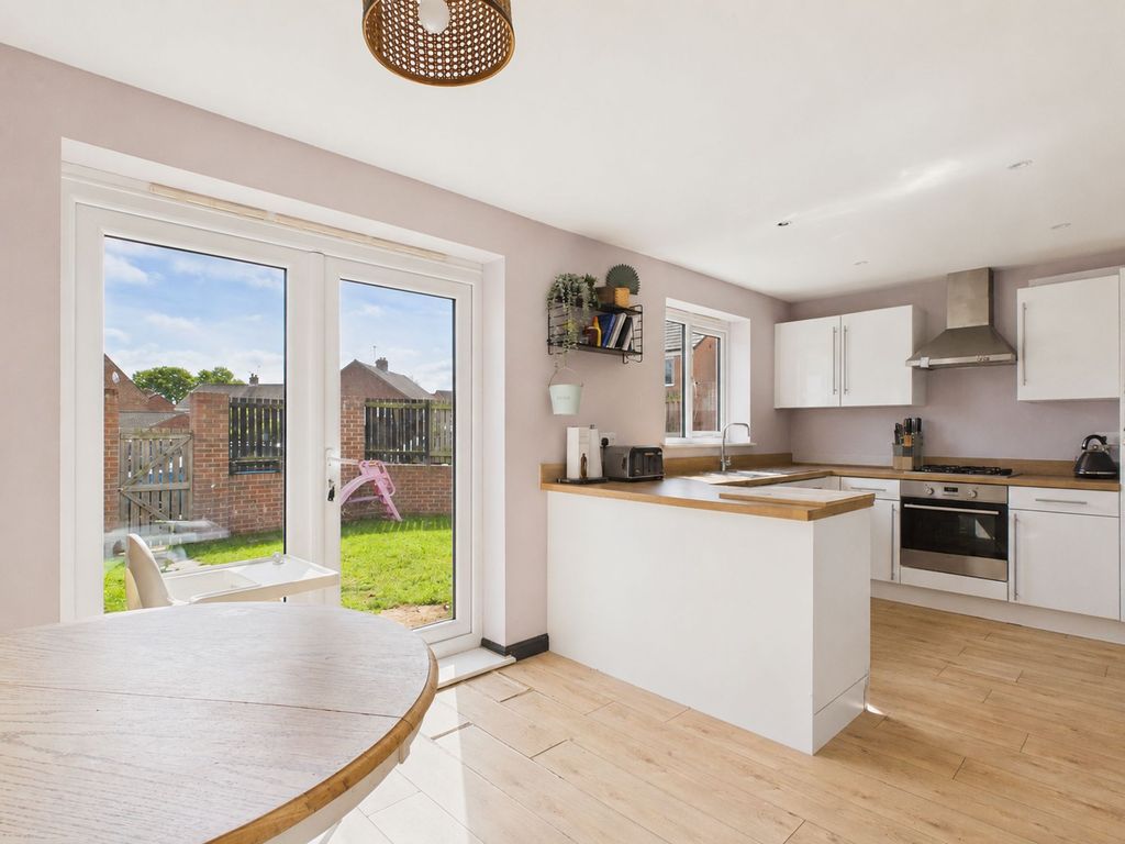 Property photo 3 of 13 Dining Kitchen