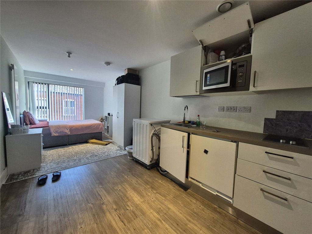 Property photo 3 of 6 Kitchen Area