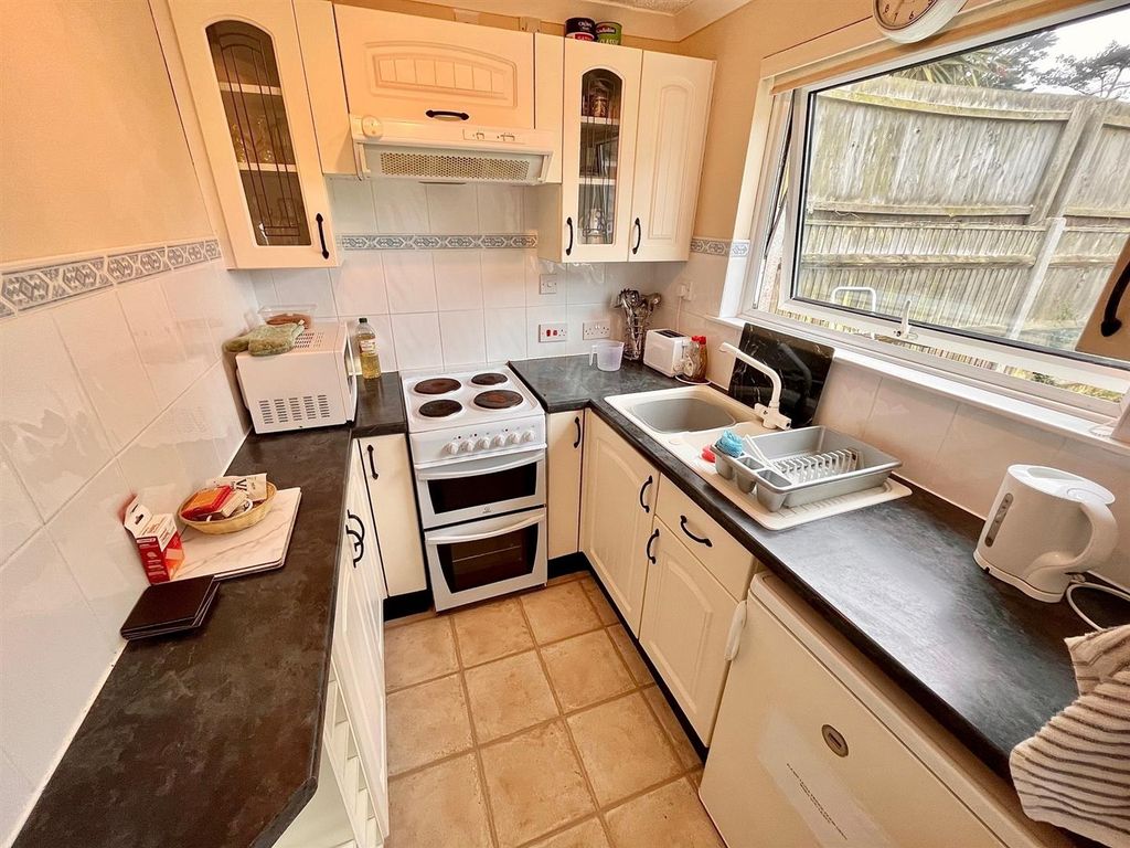 Property photo 3 of 8 Kitchen Area