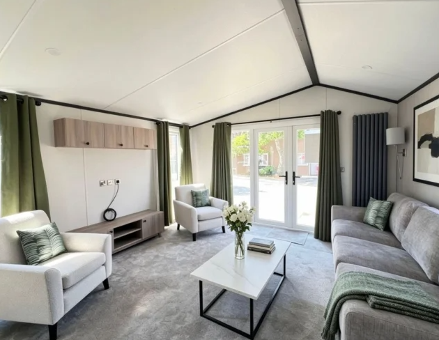 Property photo 2 of 11 Bright Modern Lounge With French Doors And Contemporary Seating