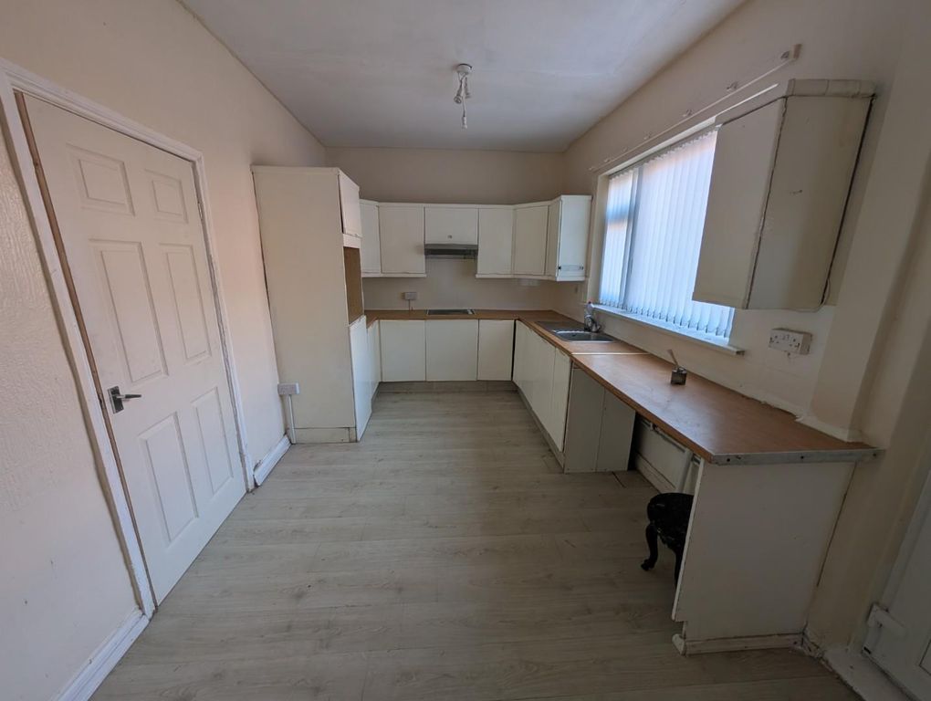 Property photo 2 of 13 Dining Kitchen