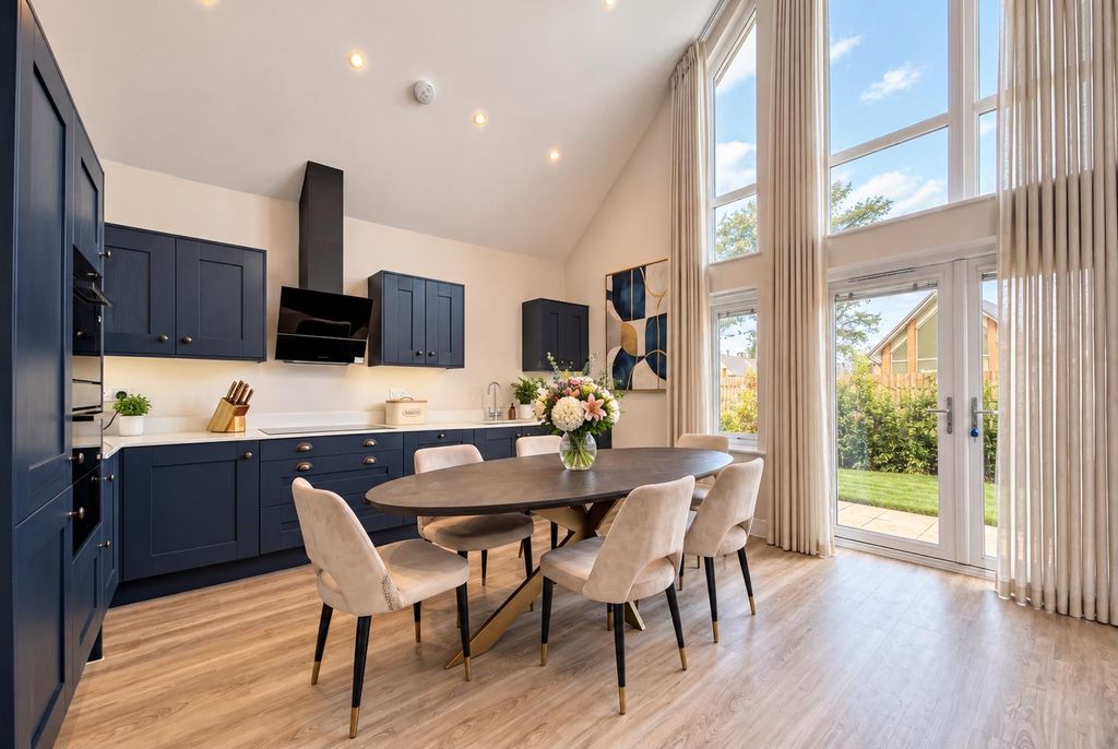Property photo 2 of 9 Elegant Navy Kitchen And Dining Room.Jpg