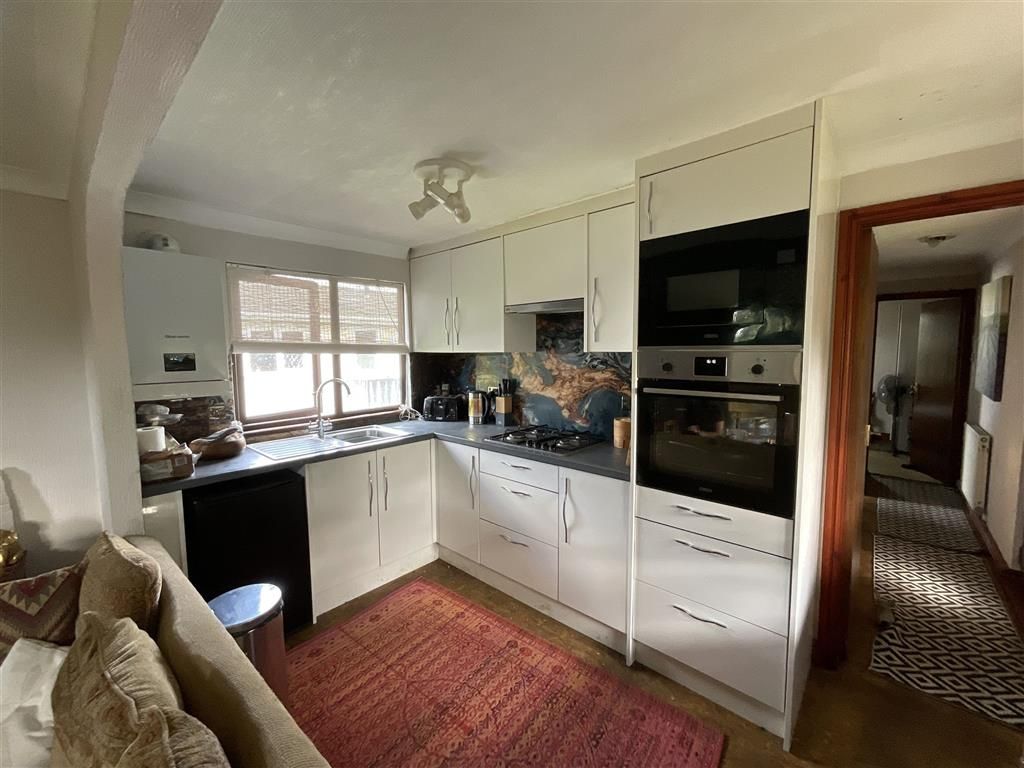Property photo 3 of 9 Kitchen Area