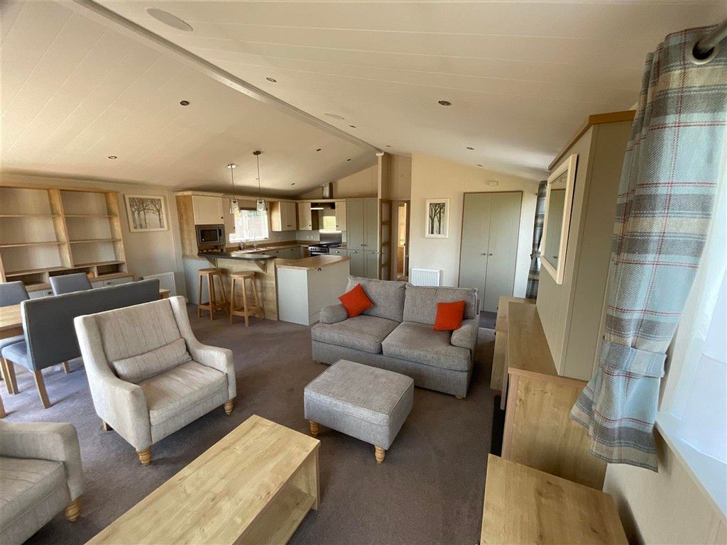 Property photo 3 of 8 Living Area