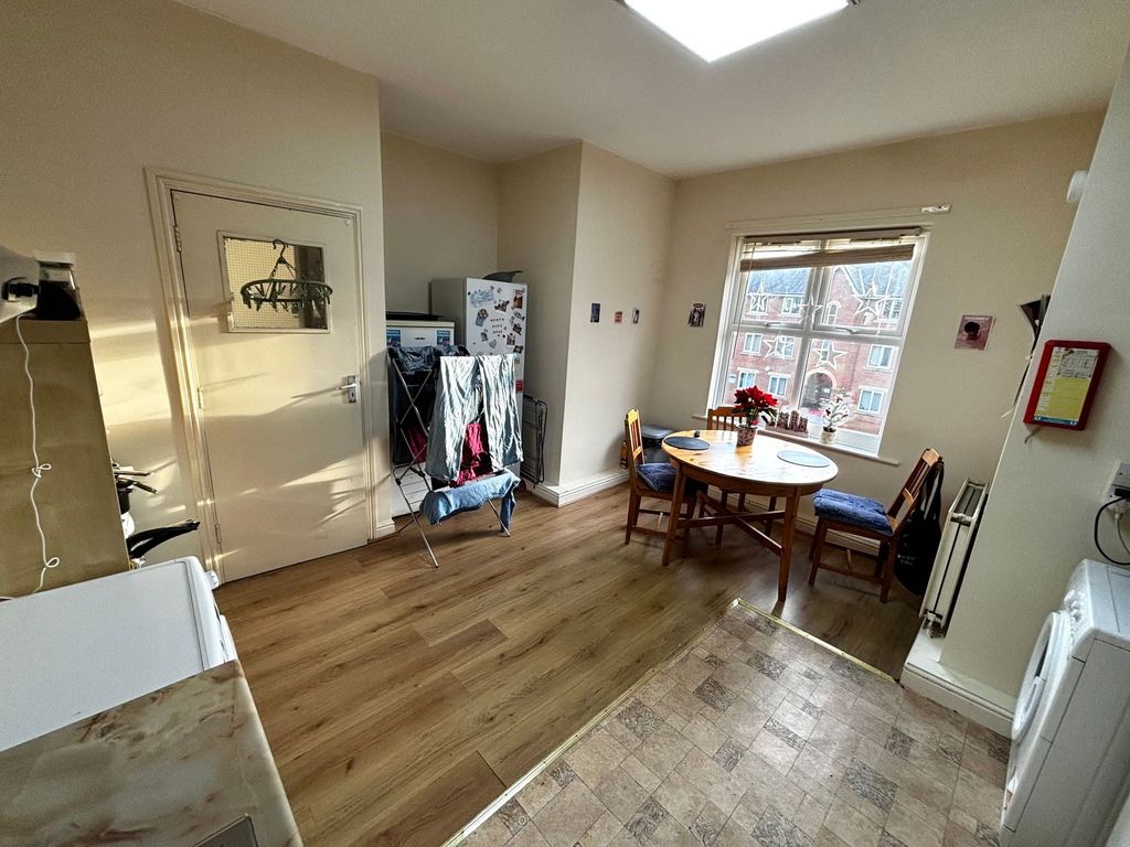 Property photo 2 of 8 Bright Kitchen/Dining Area With A Round Wooden Tab...