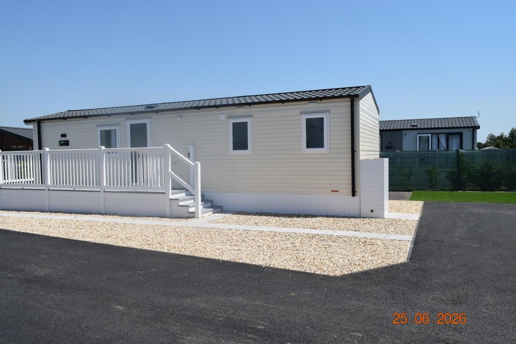 Property photo 1 of 9 6 Orchard Park
