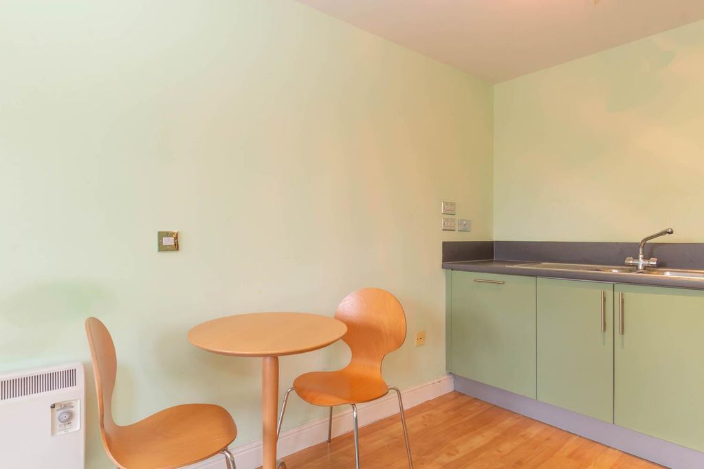 Property photo 3 of 8 Living Area