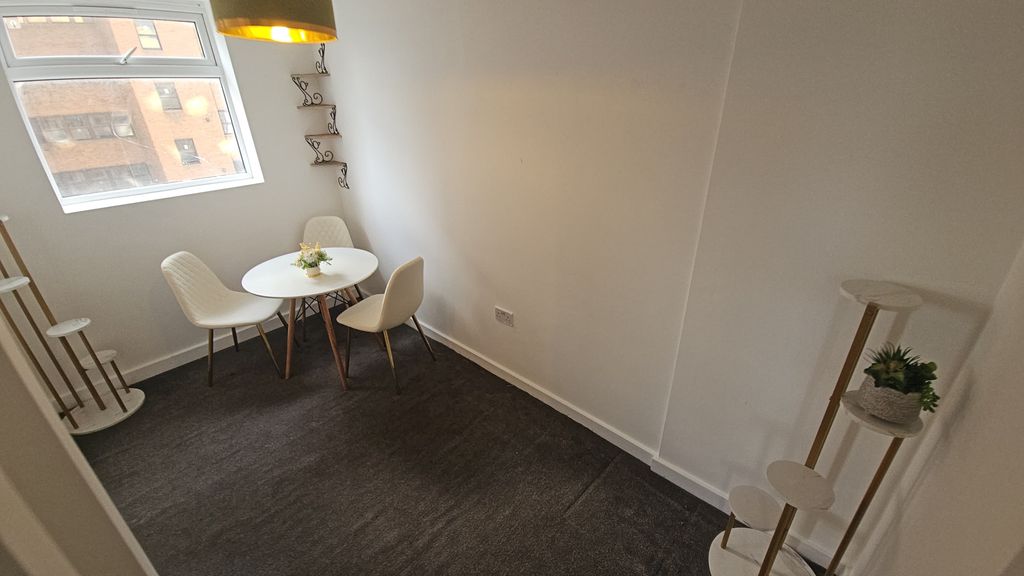 Property photo 2 of 12 Living Space