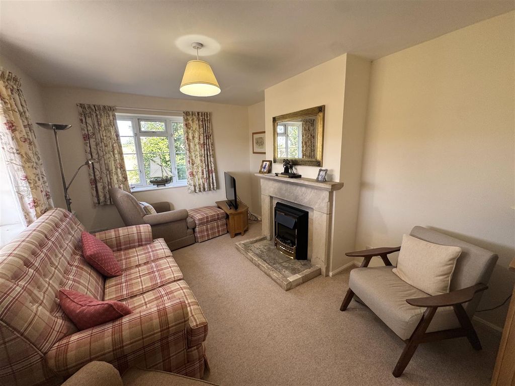 Property photo 2 of 18 Sitting Room With Feature Fireplace
