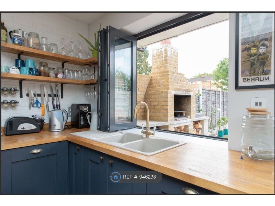 Property photo 2 of 7 Kitchen Window To Bbq