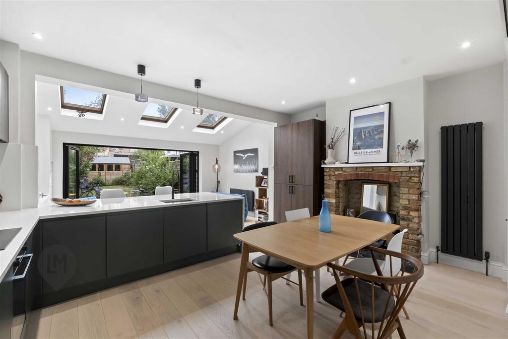 Property photo 3 of 9 Kitchen/Dining/Living