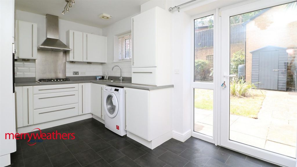 Property photo 3 of 12 Dining Kitchen
