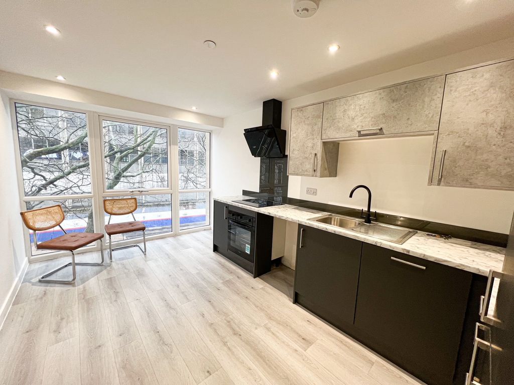 Property photo 2 of 7 Kitchen