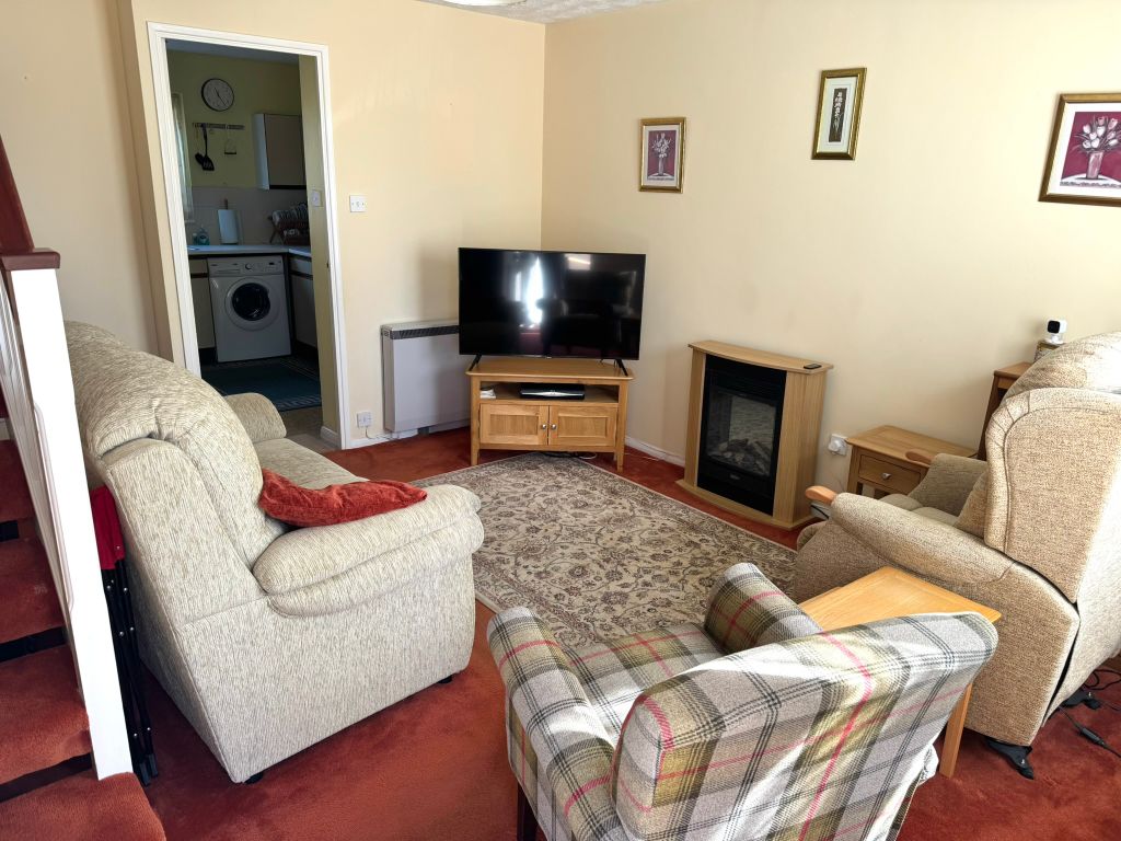Property photo 2 of 9 Sitting Room 
