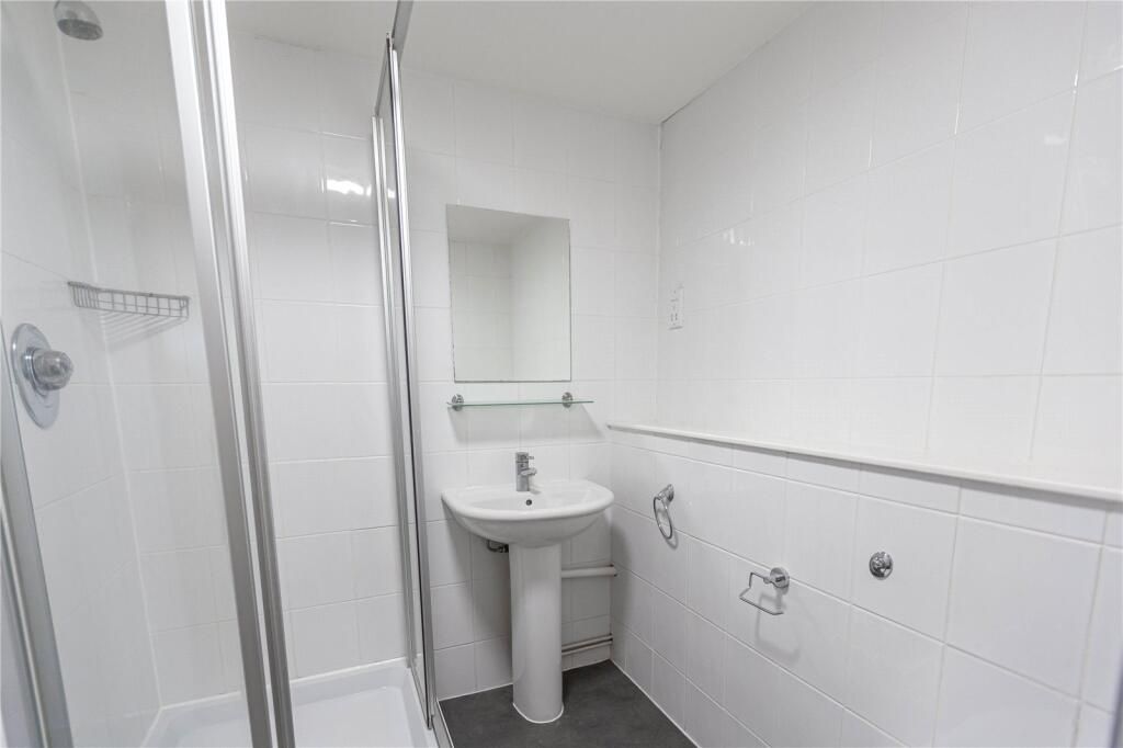 Property photo 3 of 4 A Clean And Bright Bathroom Featuring A Walk-In Sh...