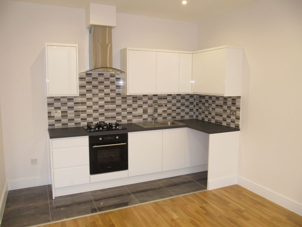 Property photo 1 of 7 Kitchen Area