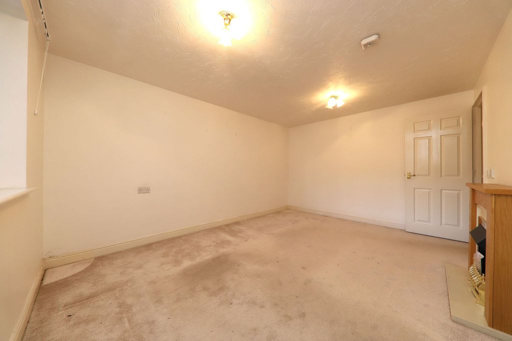 Property photo 2 of 15 Living