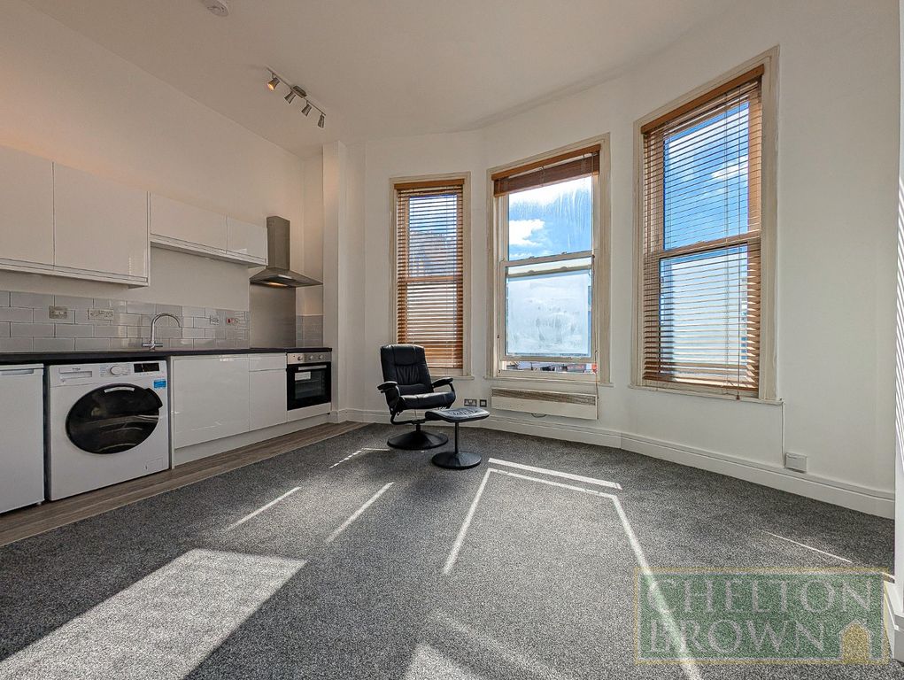 Property photo 3 of 18 Living Area