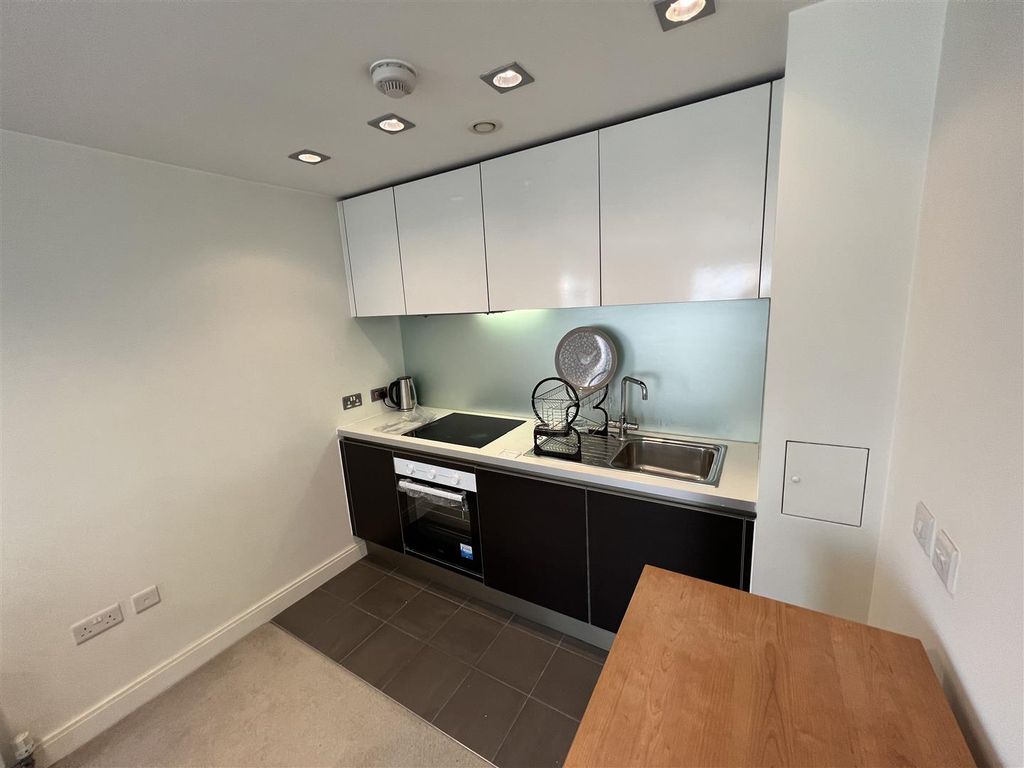 Property photo 3 of 9 Kitchen Area
