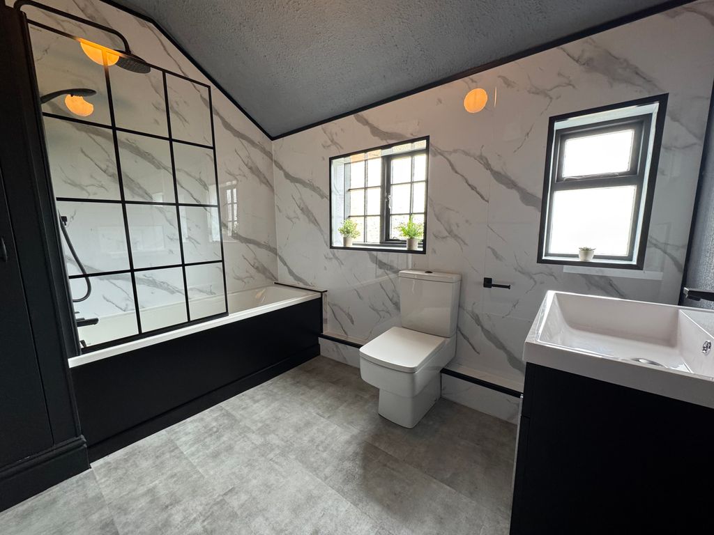Property photo 3 of 9     Stunning High-Spec Bathroom With Marble-Effect Finish, Black-Framed Shower Screen And Premium Co
