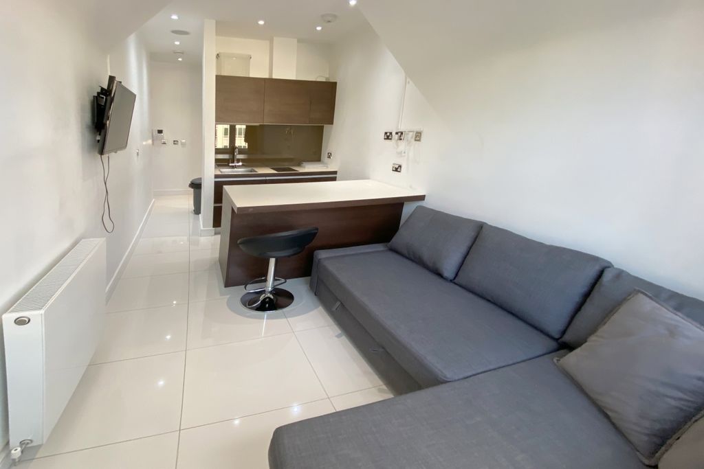 Property photo 2 of 10 Living Area