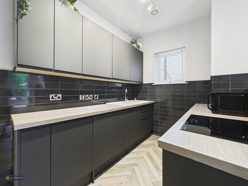 Property photo 2 of 10 Kitchen Area