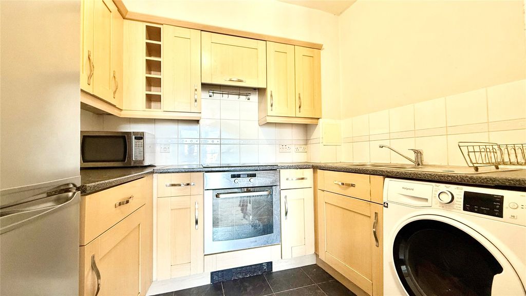 Property photo 3 of 7 Kitchen
