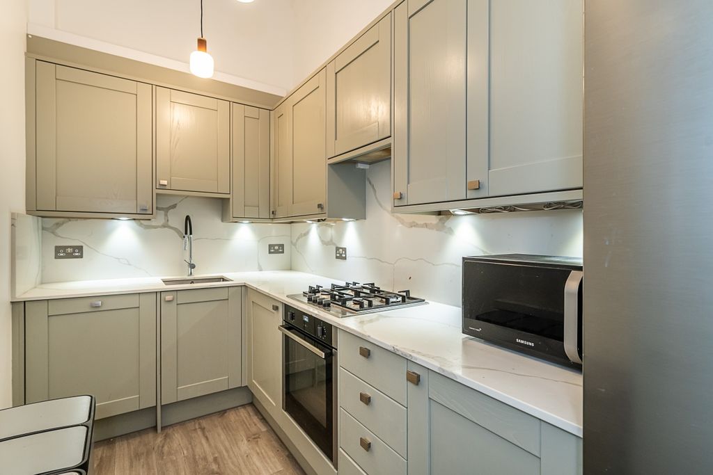 Property photo 2 of 12 Kitchen